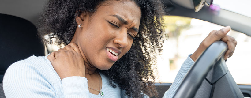 patient with neck pain in need of auto accident injury care in Garland
